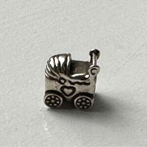 Pandora baby carriage charm. Sterling silver.